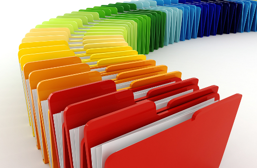 line of colored file folders with white pages inside