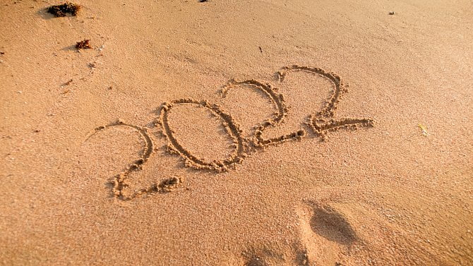 2022 written on a beach