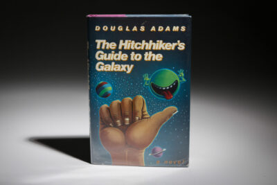 book cover The Hitchhiker's Guide to the Galaxy showing planets and a thumb in hitchhiking position